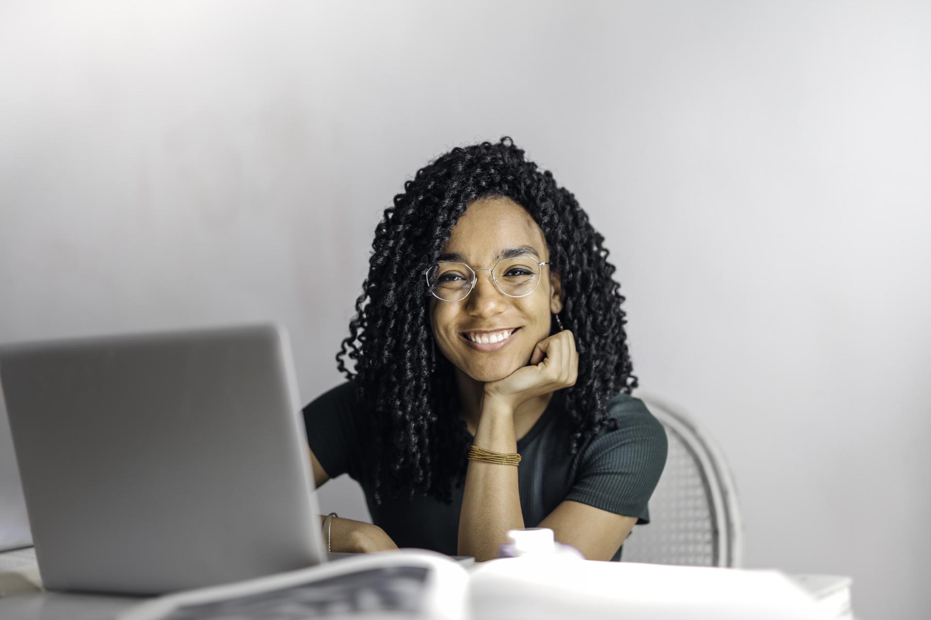 smiling girl with computer